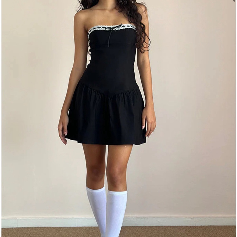 Manisha Mini Dress in Black with White Trim from Motel Rocks